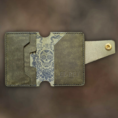Minimalist Lowlife by El Rey Leather in olive leather with detailed outlaw ink skull design.