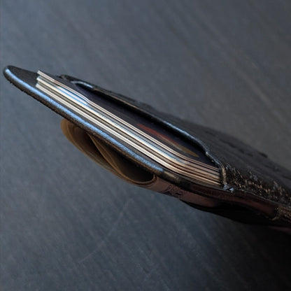 A tight closeup highlighting the ruggedly sleek profile and glass-slick, hand-burnished edges of The Melee in Black.
