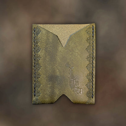 The Deadbeat minimalist wallet in olive leather with hand-struck embossed design by EL REY LEATHER.