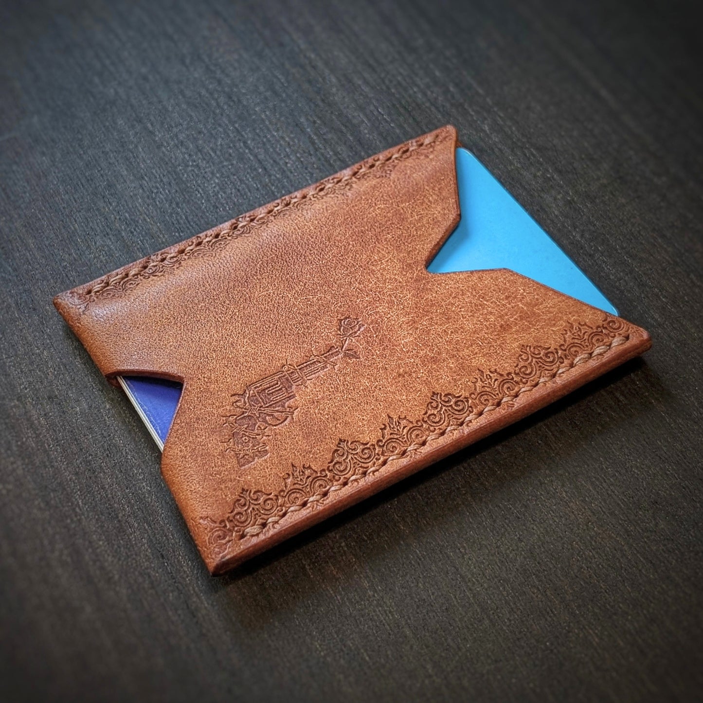 El Rey Leather Deadbeat minimalist leather wallet in cognac featuring hand-stitching and stamped borders.