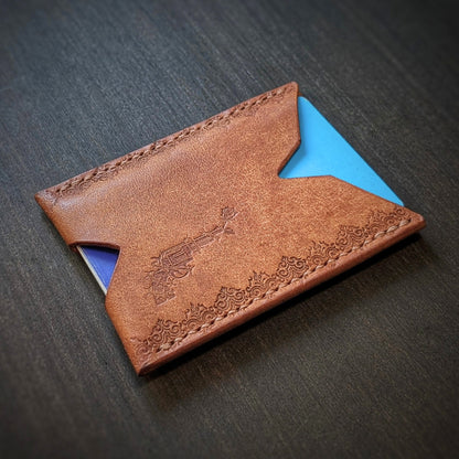 El Rey Leather Deadbeat minimalist leather wallet in cognac featuring hand-stitching and stamped borders.