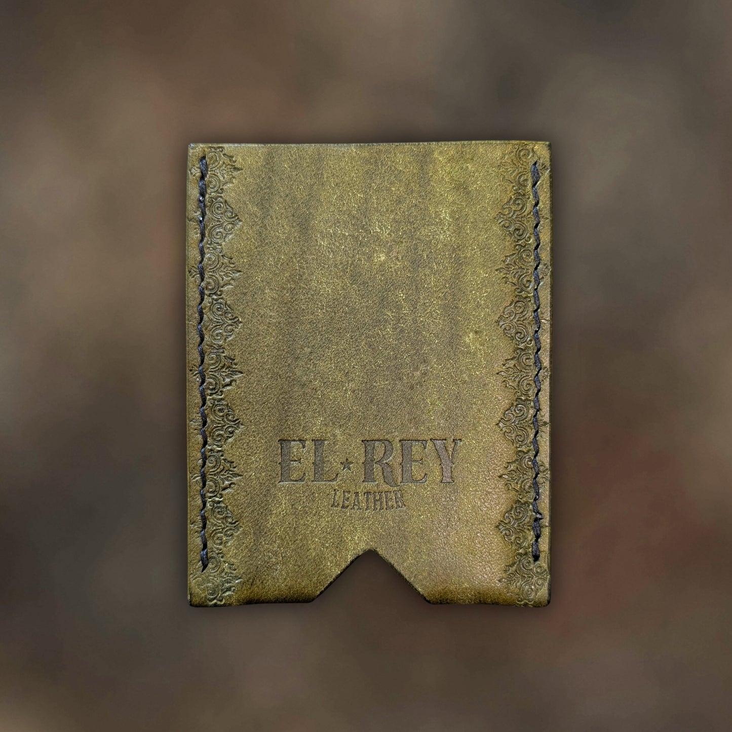 Back view of The Deadbeat EDC cardholder showcasing rugged construction and premium olive leather grain.