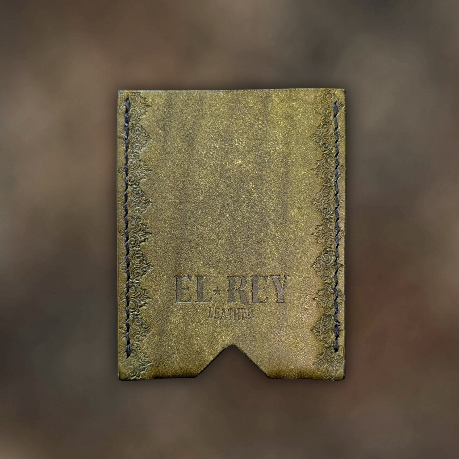 Back view of The Deadbeat EDC cardholder showcasing rugged construction and premium olive leather grain.