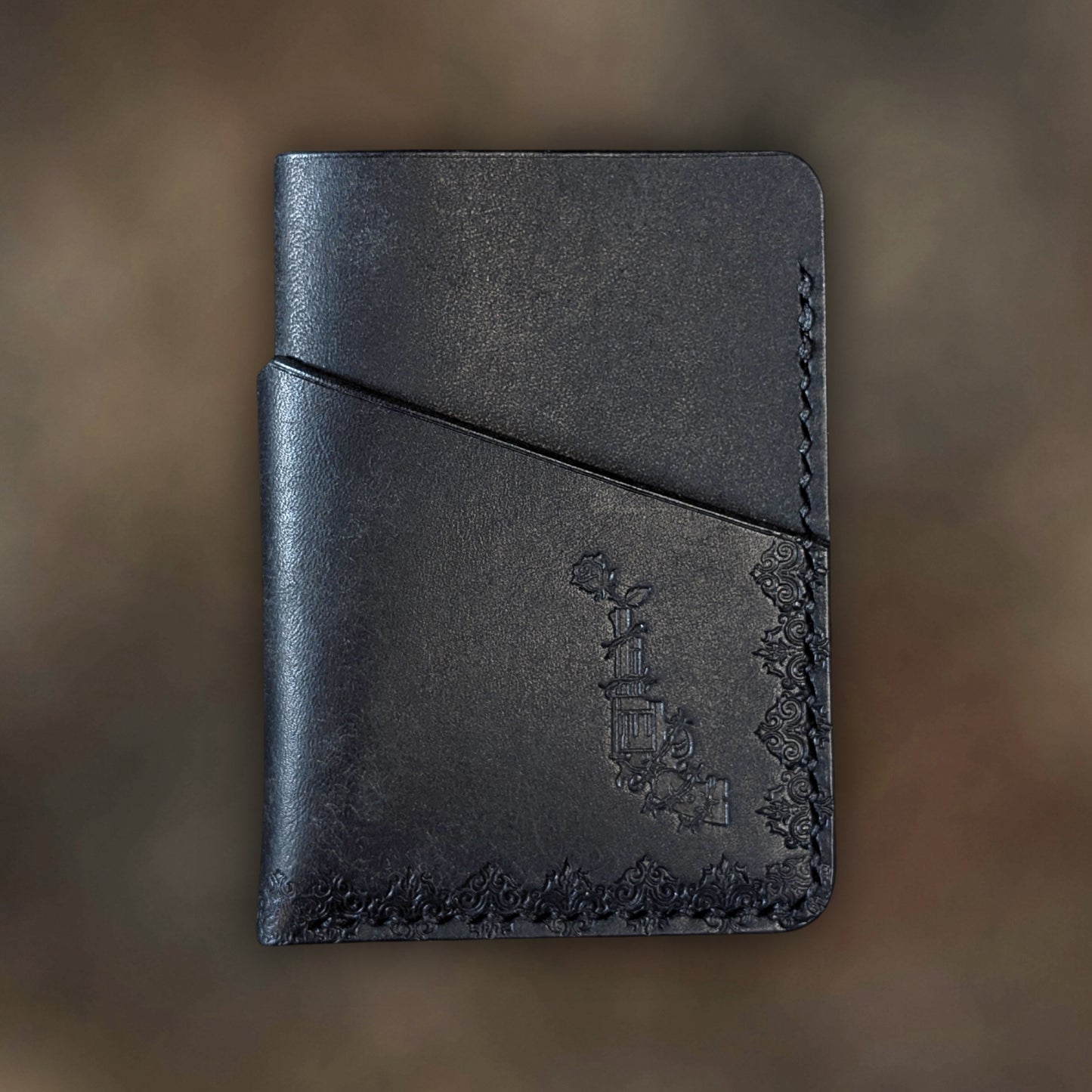 The Traitor wallet in Black Italian Pueblo leather with an embossed design by EL REY LEATHER.
