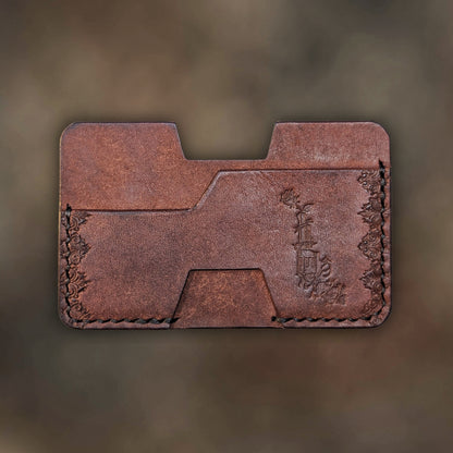 The Shiv wallet in Tobacco Italian Pueblo leather with an embossed design by EL REY LEATHER.