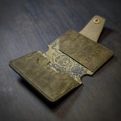 Internal pocket view of The Lowlife slim cash and card organizer in premium olive leather.