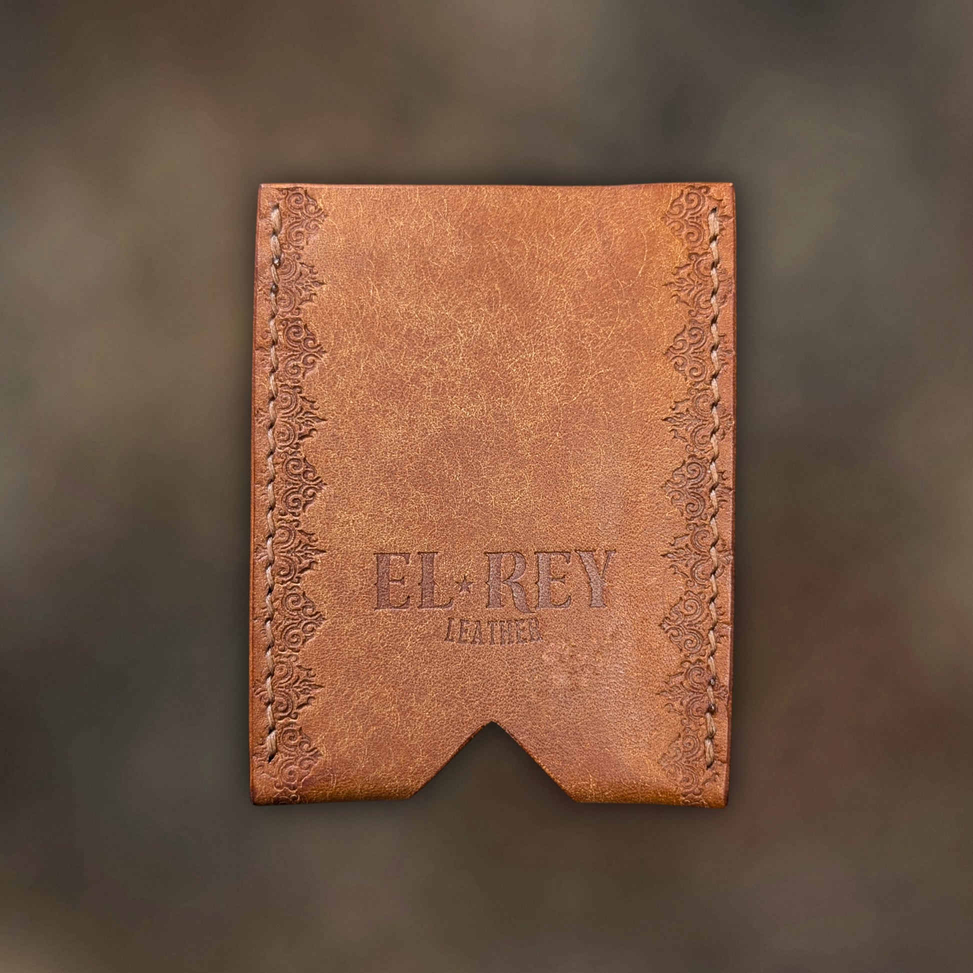 Back view of The Deadbeat EDC cardholder showcasing rugged construction and premium cognac leather grain.
