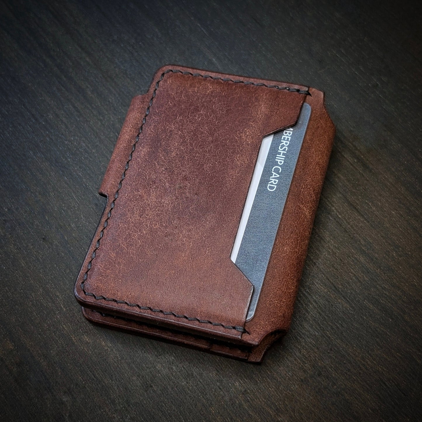 Back view of The Lowlife EDC cardholder showcasing rugged construction and premium Tobacco leather grain.