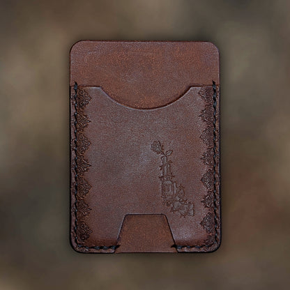 The Contra wallet in Tobacco Italian Pueblo leather with an embossed design by EL REY LEATHER.
