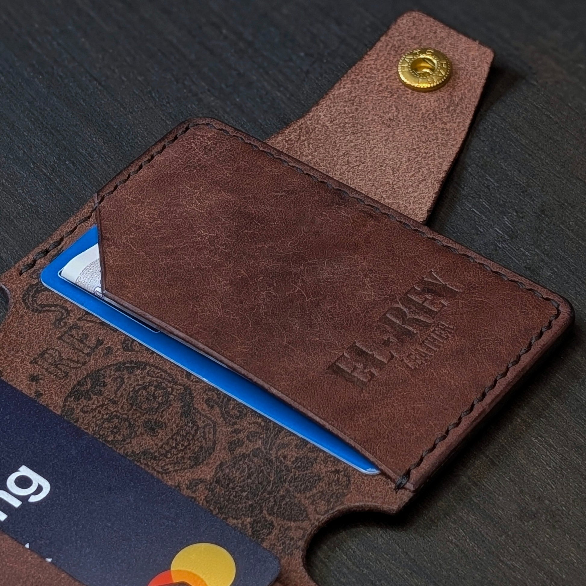 Internal pocket view of The Lowlife slim cash and card organizer in premium tobacco leather.