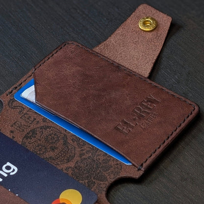 Internal pocket view of The Lowlife slim cash and card organizer in premium tobacco leather.