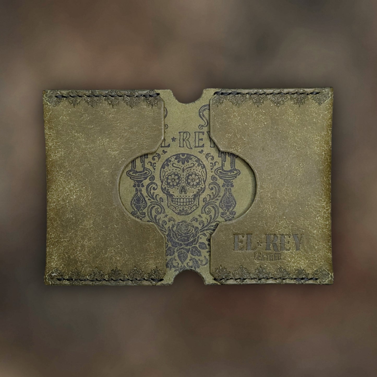 The Daytona wallet in Olive Italian Pueblo leather with an embossed design by EL REY LEATHER.
