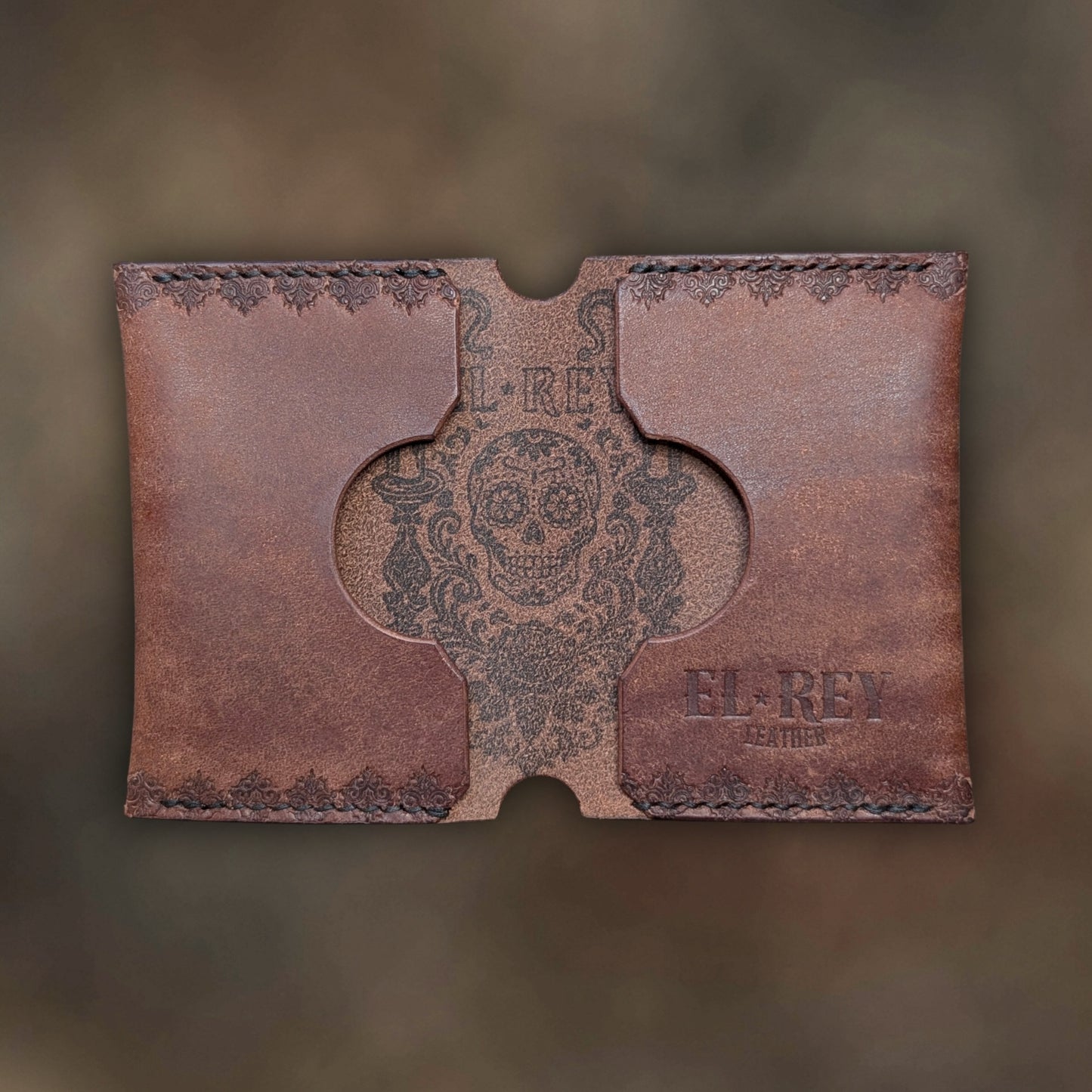 The Daytona wallet in Tobacco Italian Pueblo leather with an embossed design by EL REY LEATHER.