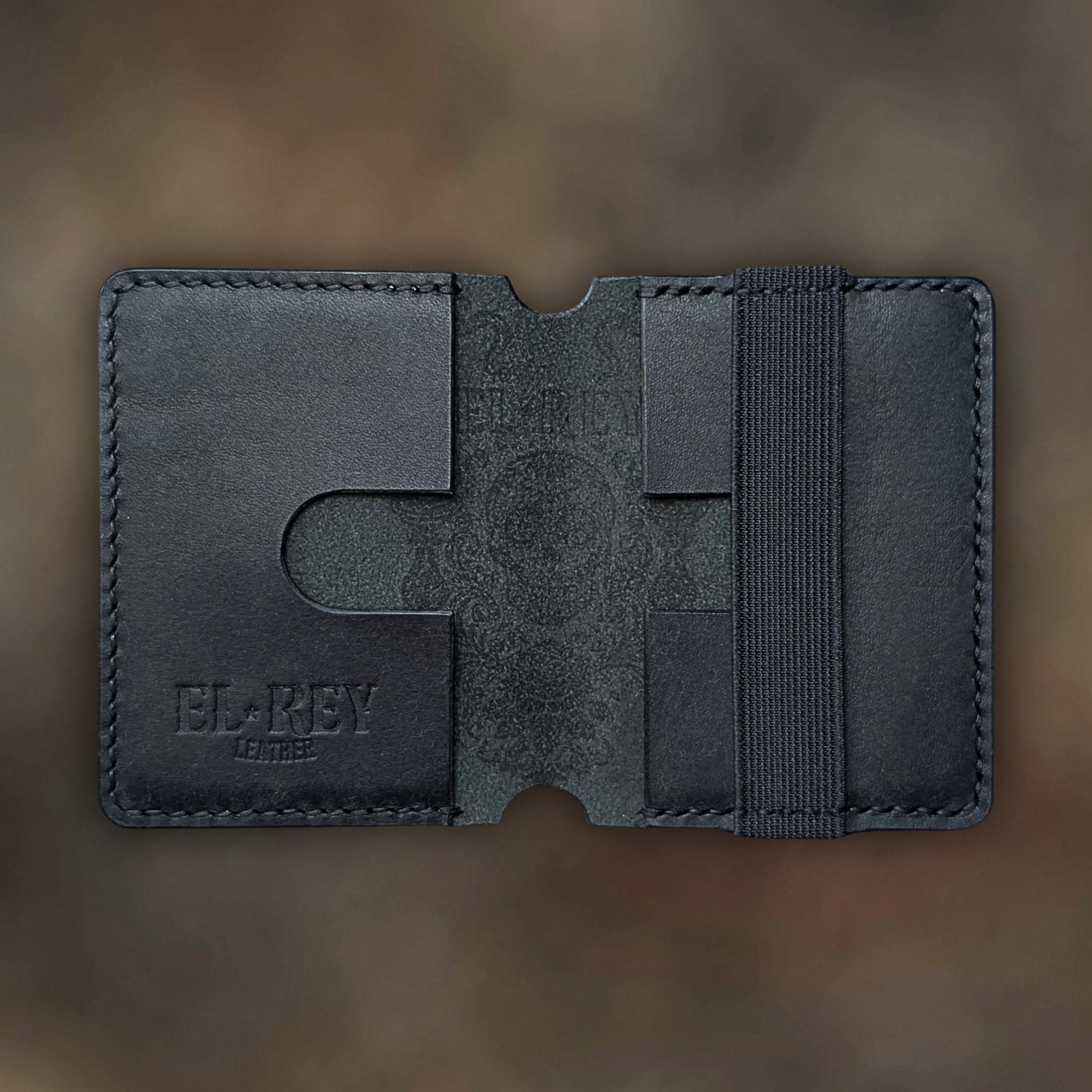 The Scoundrel wallet in Black Italian Pueblo leather with an embossed design by EL REY LEATHER.