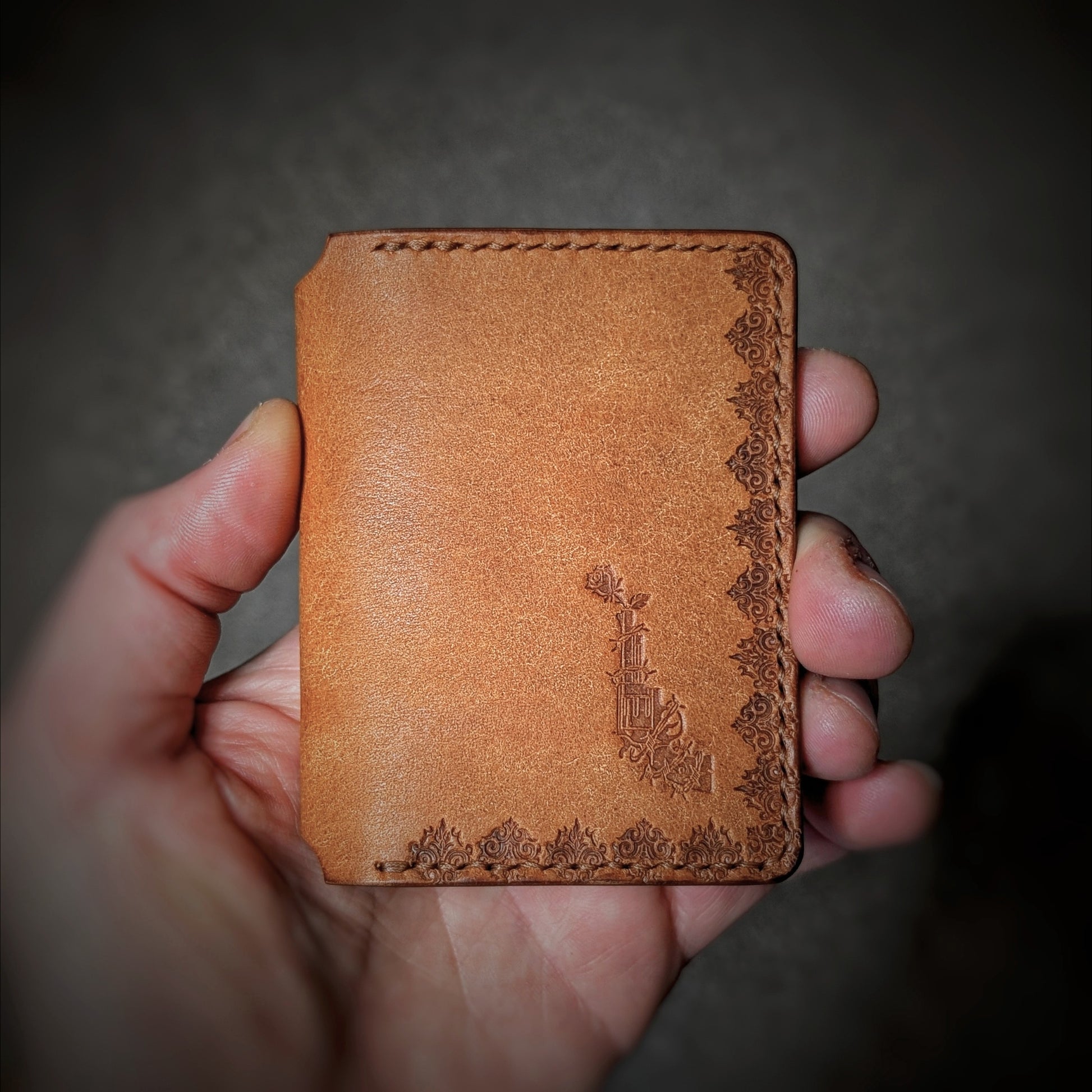 The Scoundrel wallet in Cognac Italian Pueblo leather with an embossed design by EL REY LEATHER.