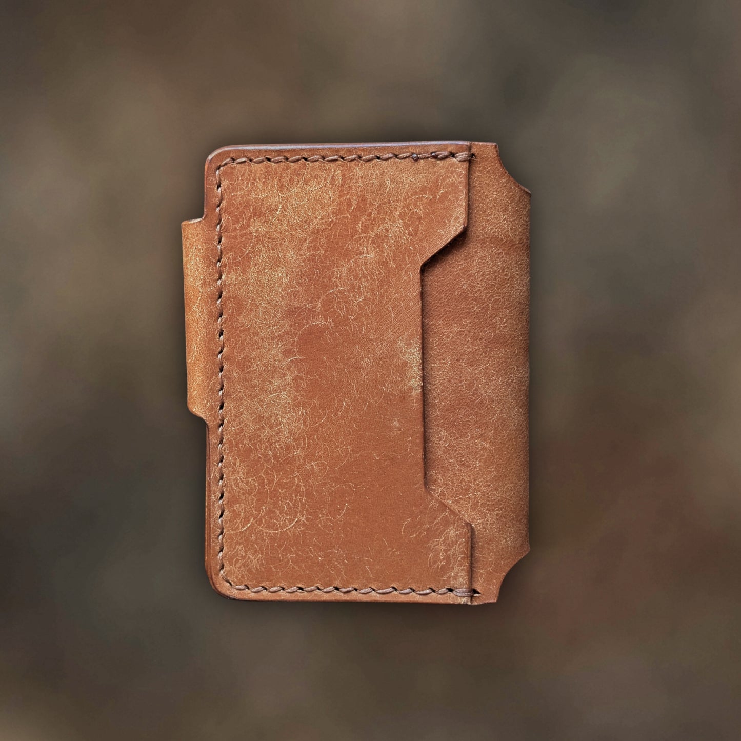 Back view of The Lowlife EDC cardholder showcasing rugged construction and premium Cognac leather grain.