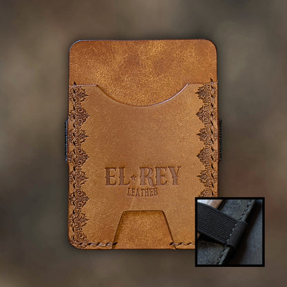 The Melee minimalist wallet in Cognac leather with hand-struck embossed design by EL REY LEATHER.
