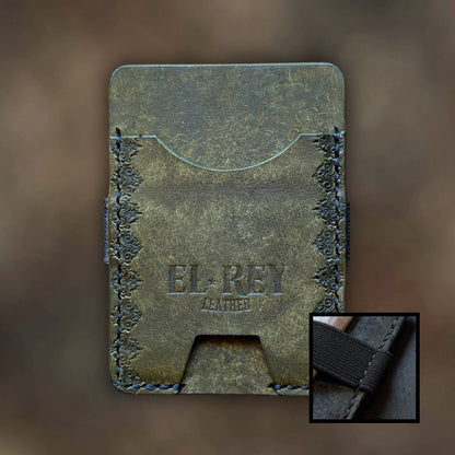 The Melee minimalist wallet in Olive leather with hand-struck embossed design by EL REY LEATHER.