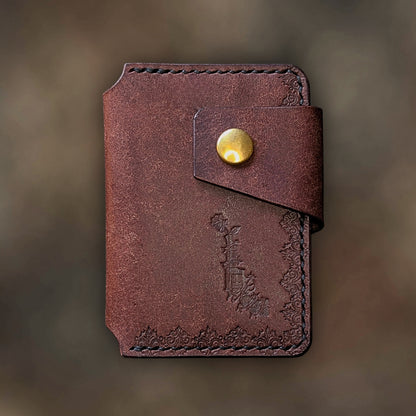 The Lowlife minimalist wallet in Tobacco leather with hand-struck embossed design by EL REY LEATHER.