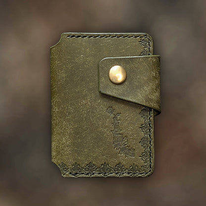 The Lowlife minimalist wallet in Olive leather with hand-struck embossed design by EL REY LEATHER.