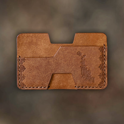 The Shiv wallet in Cognac Italian Pueblo leather with an embossed design by EL REY LEATHER.