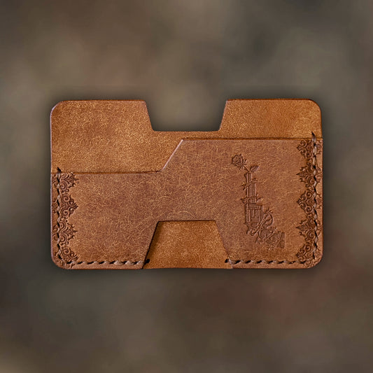 The Shiv wallet in Cognac Italian Pueblo leather with an embossed design by EL REY LEATHER.
