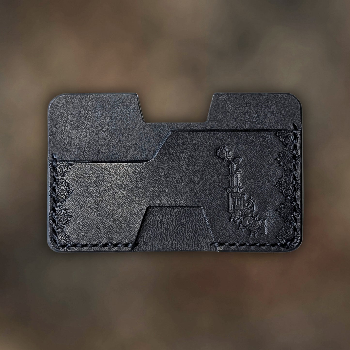 The Shiv wallet in Black Italian Pueblo leather with an embossed design by EL REY LEATHER.