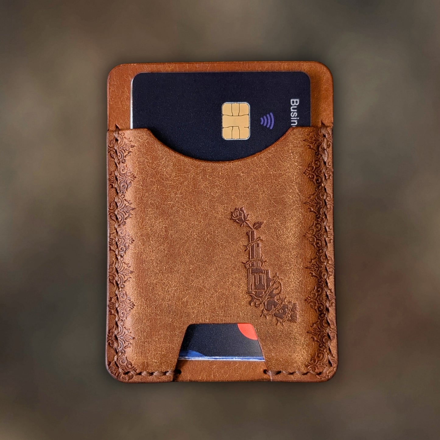 The Contra wallet in Cognac Italian Pueblo leather with an embossed design by EL REY LEATHER.